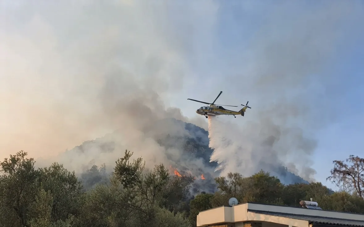Alevlerin Arasından Eve Dönüş: Fethiye'deki Yangın Korku Dolu Anları Geride Bıraktı!